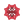 Bottom view of red Pulsar golf spike on a white backgr