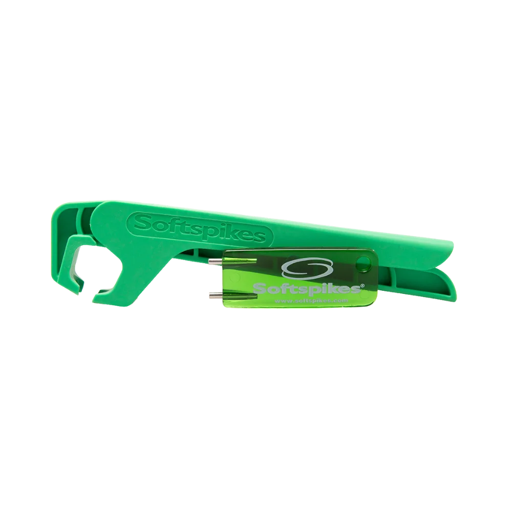 A green golf shoe spike tool and a soft spikes container.